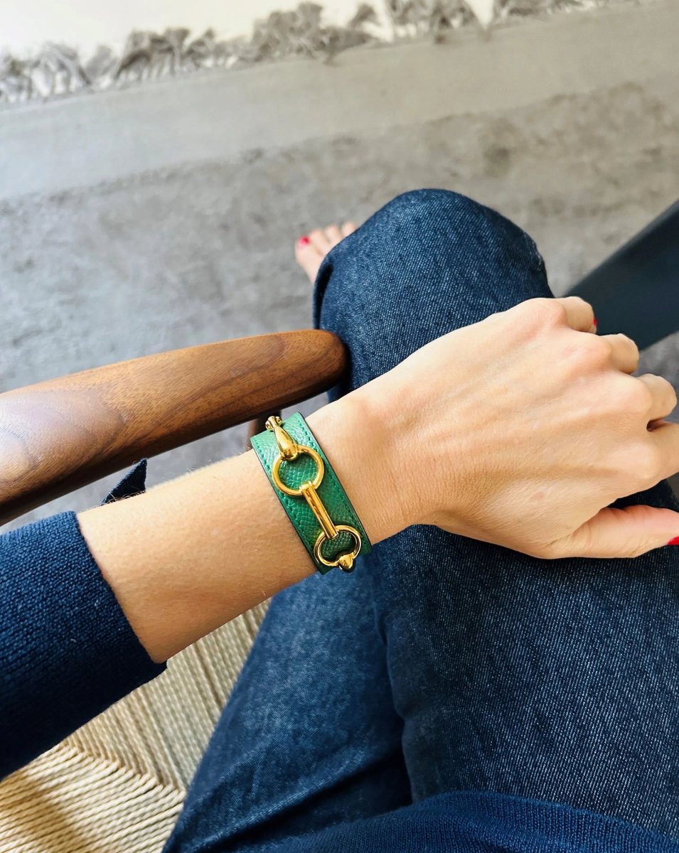 Bracelet de la maison Hermès en cuir et métal doré - Castafiore