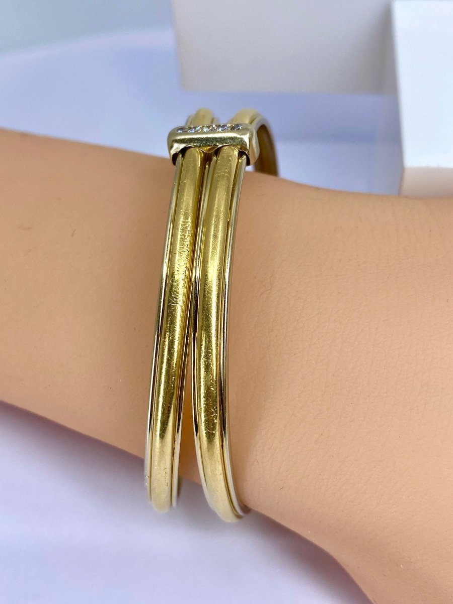 Bracelet double joncs or 18 carats, diamants, Yves Saint Laurent
