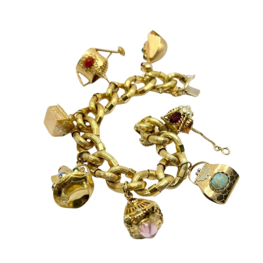 Bracelet en or 18 carats avec breloques, années 1950 - Castafiore