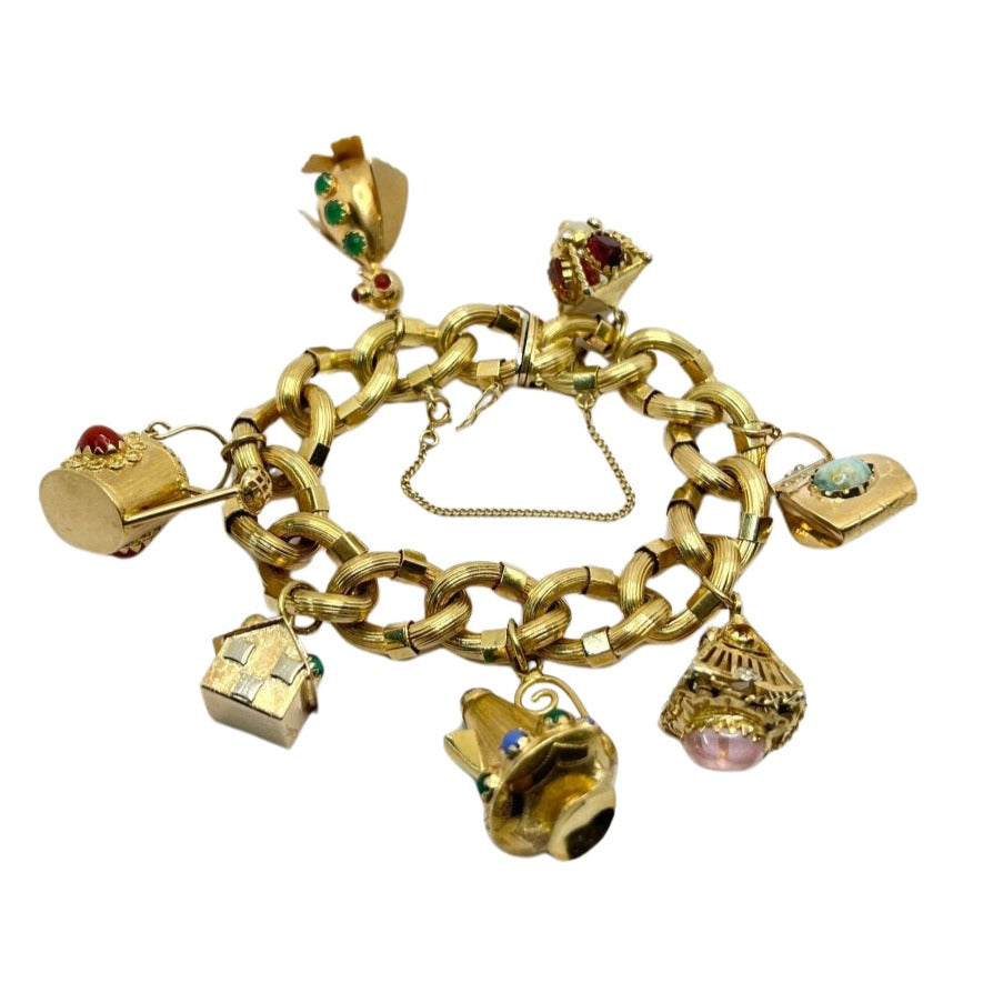 Bracelet en or 18 carats avec breloques, années 1950 - Castafiore
