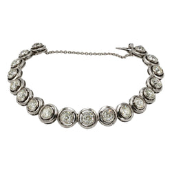 Bracelet en or blanc, argent et diamants
