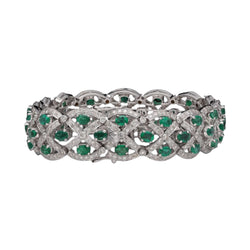 Bracelet en Or gris 18 Cts avec Diamants et émeraudes vers 2000. - Castafiore