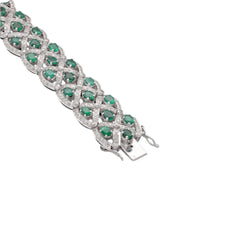 Bracelet en Or gris 18 Cts avec Diamants et émeraudes vers 2000. - Castafiore