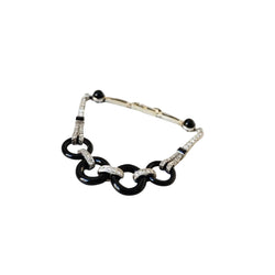 Bracelet en or gris, onyx et diamants - Castafiore