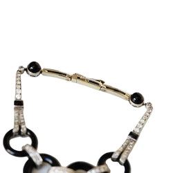 Bracelet en or gris, onyx et diamants - Castafiore