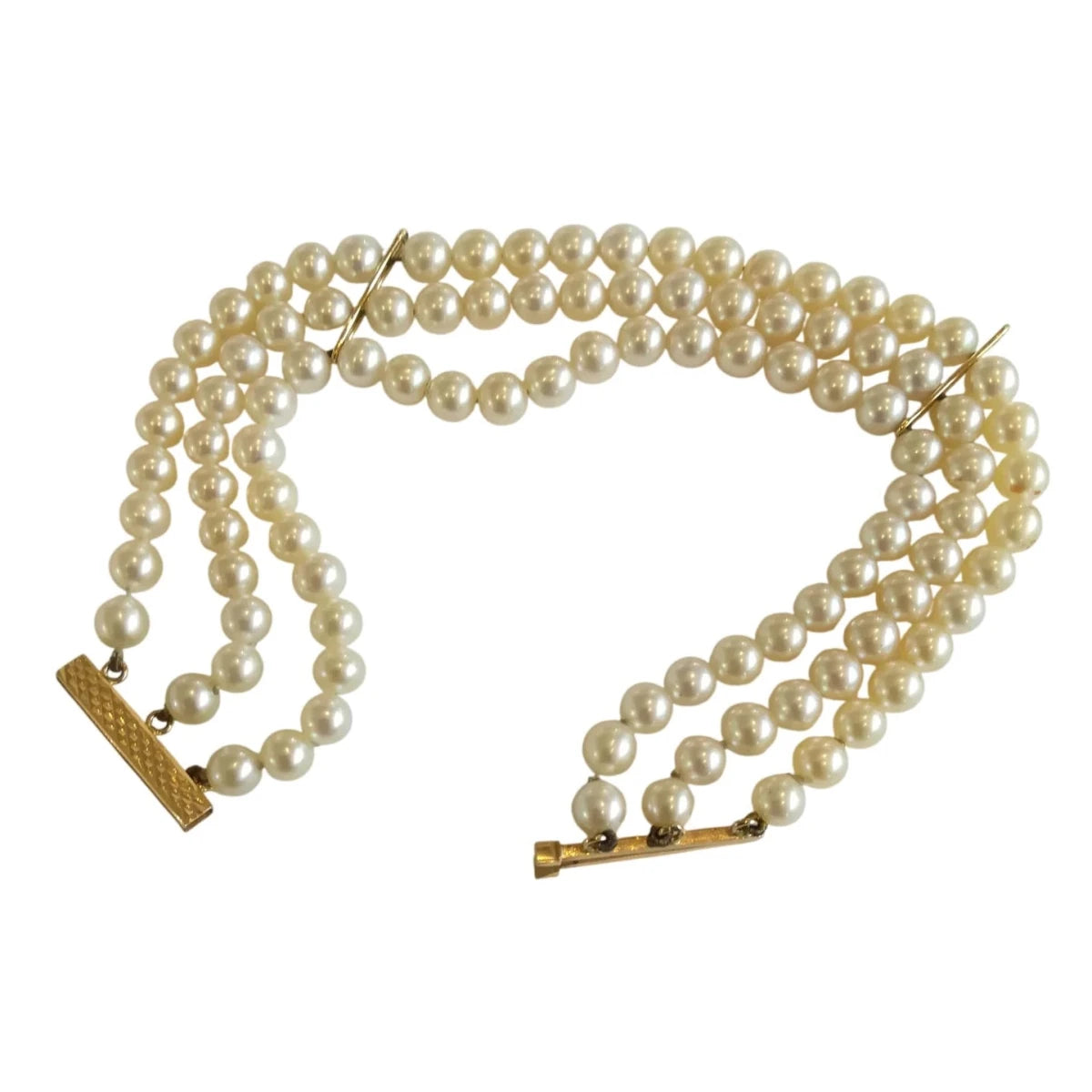 Bracelet en or jaune et perles - Castafiore
