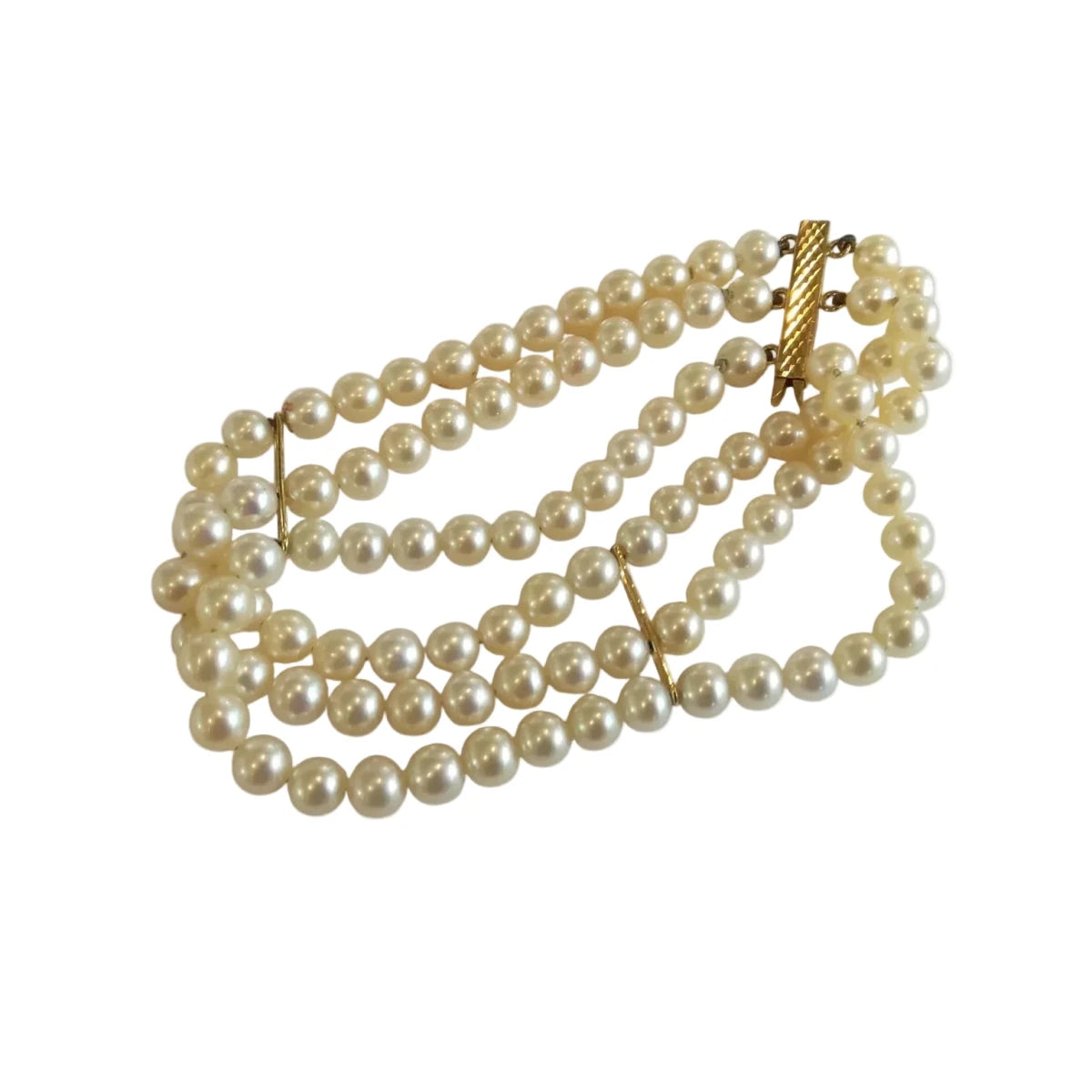 Bracelet en or jaune et perles - Castafiore