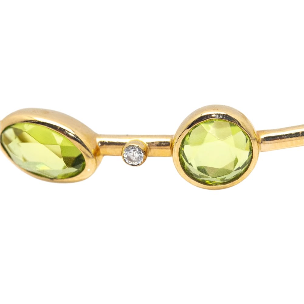Bracelet en or jaune, péridot et diamants - Castafiore
