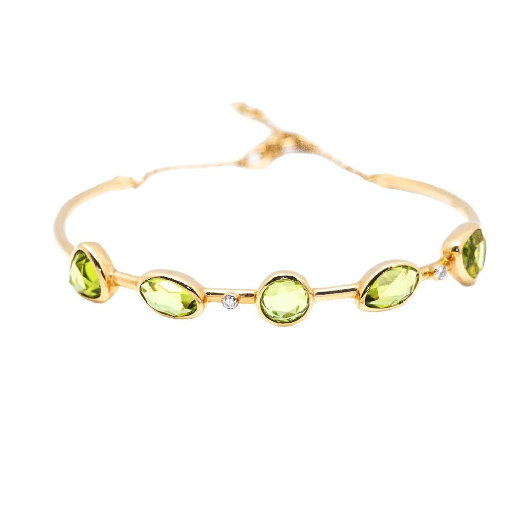 Bracelet en or jaune, péridot et diamants - Castafiore