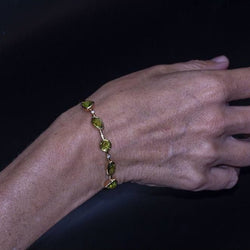 Bracelet en or jaune, péridot et diamants - Castafiore