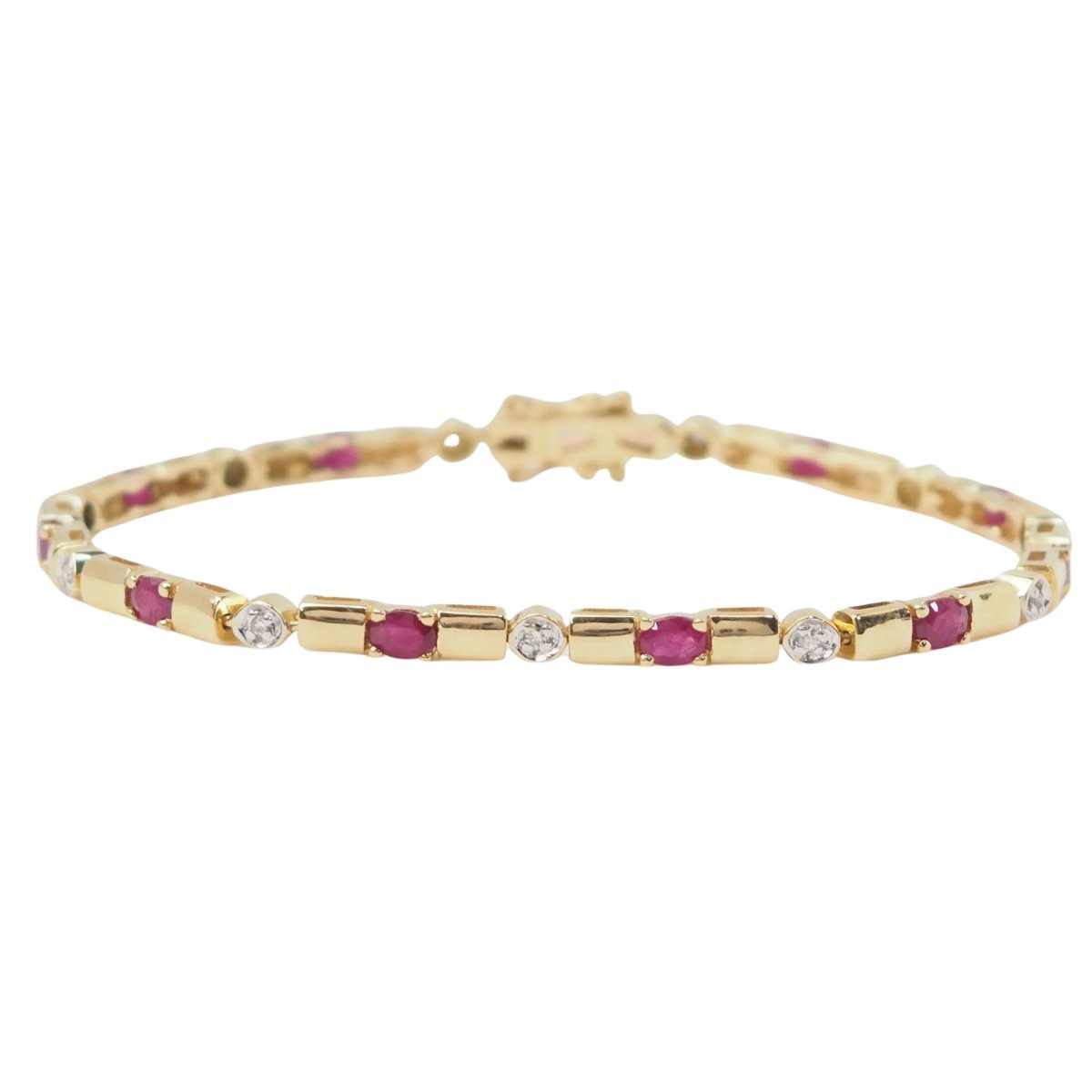 Bracelet en or jaune, rubis et diamants - Castafiore