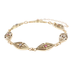 Bracelet en or jaune, rubis et diamants - Castafiore