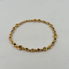 Bracelet en or jaune, saphirs et rubis - Castafiore