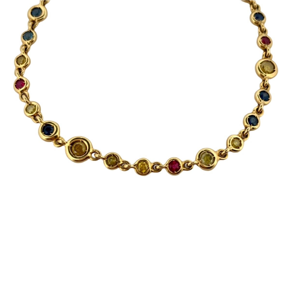 Bracelet en or jaune, saphirs et rubis - Castafiore