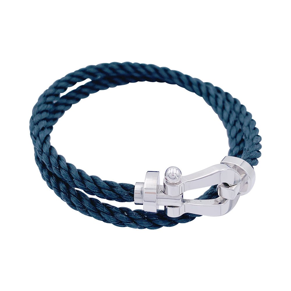 Bracelet Fred, "Force 10", en or blanc et acier. - Castafiore