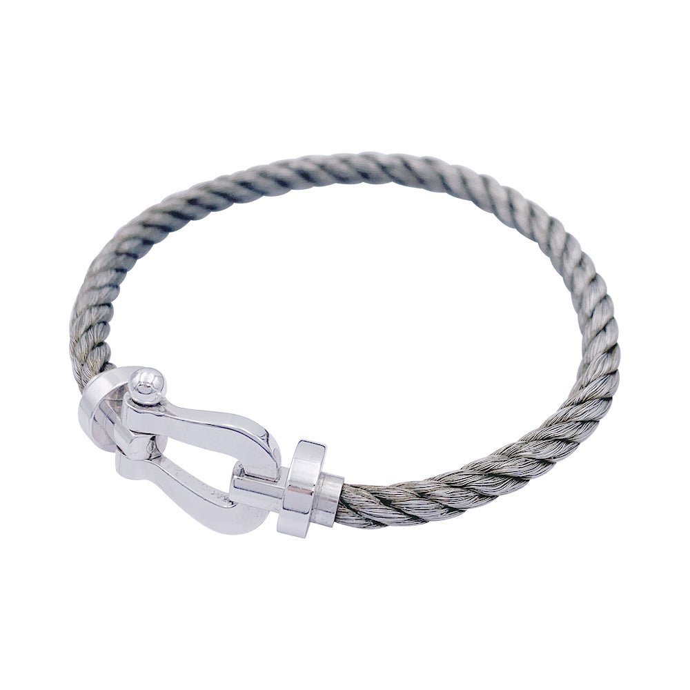 Bracelet Fred, "Force 10", en or blanc et acier. - Castafiore