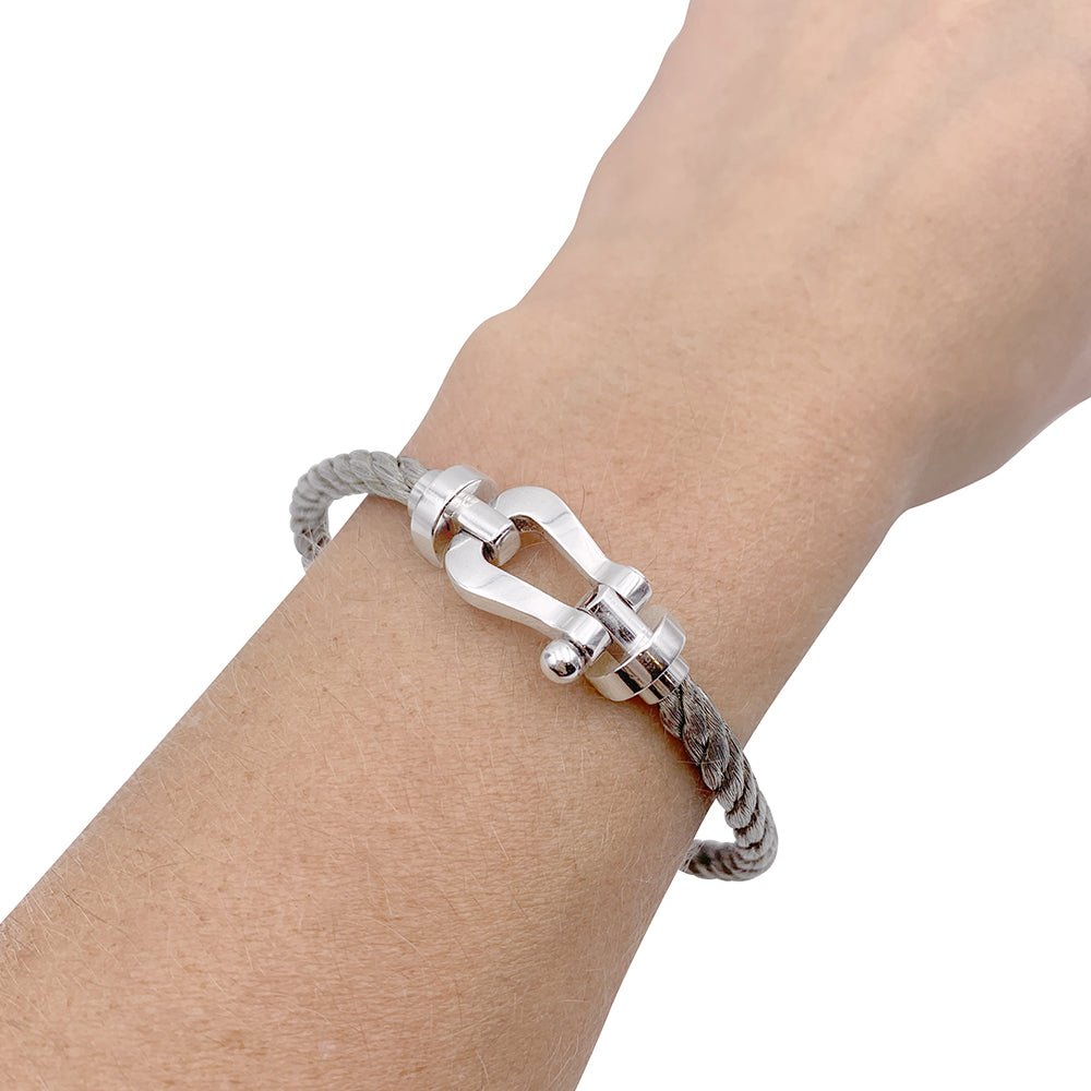 Bracelet Fred, "Force 10", en or blanc et acier. - Castafiore