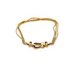 Bracelet FRED, "Force 10" en or jaune. - Castafiore