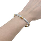 Bracelet FRED "Force 10" en or jaune et acier - Castafiore