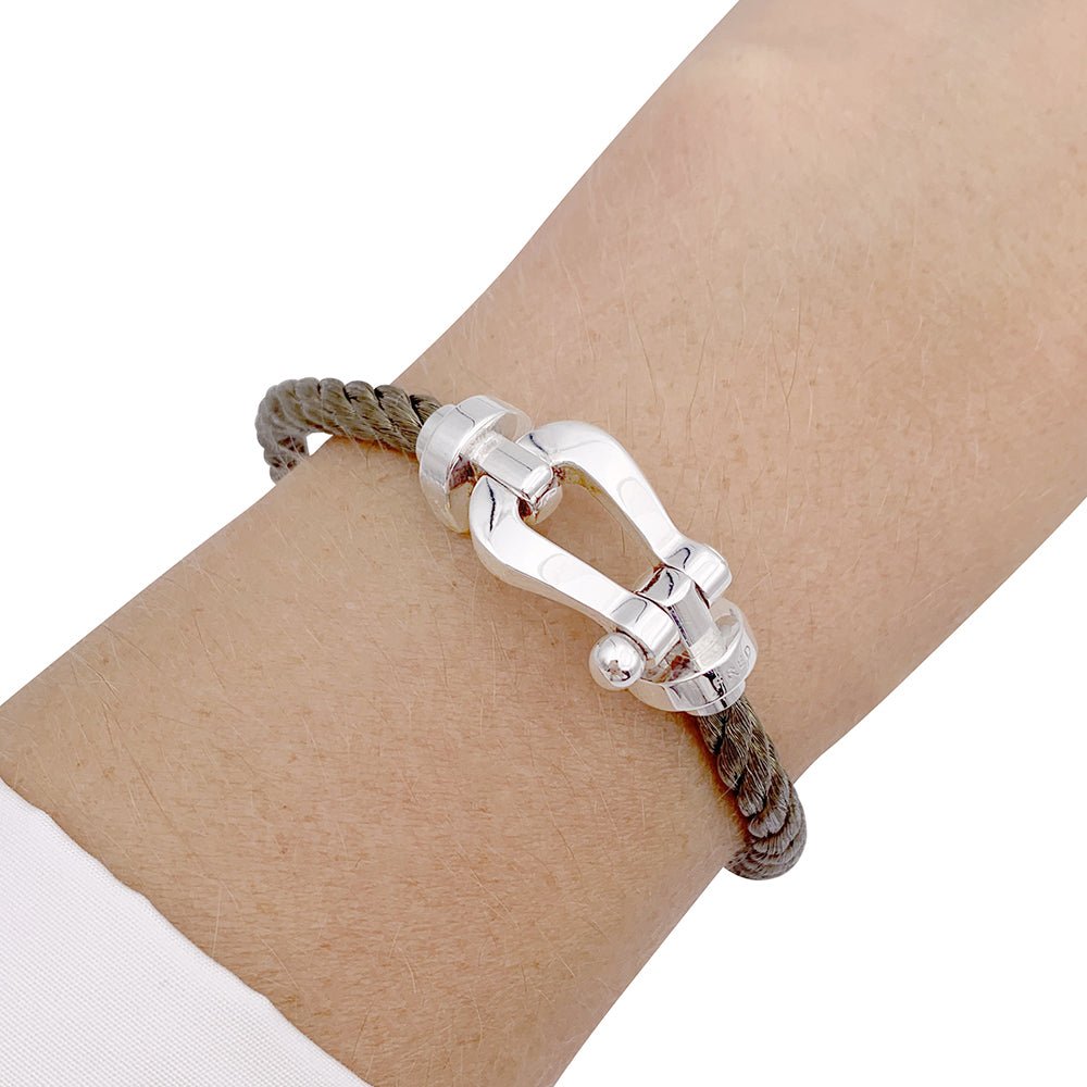 Bracelet Fred,"Force 10", en or blanc et acier. - Castafiore