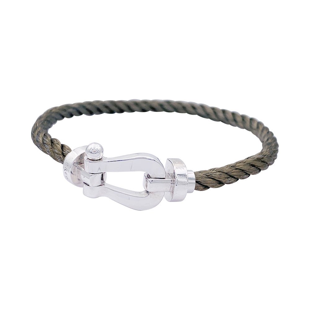 Bracelet Fred,"Force 10", en or blanc et acier. - Castafiore