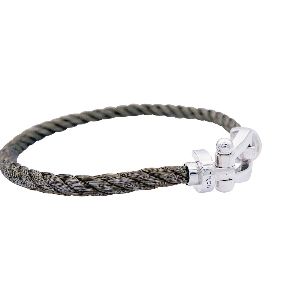 Bracelet Fred,"Force 10", en or blanc et acier. - Castafiore