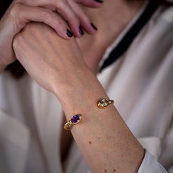 Bracelet Jonc BULGARI en or jaune, améthyste et quartz de rutile - Castafiore