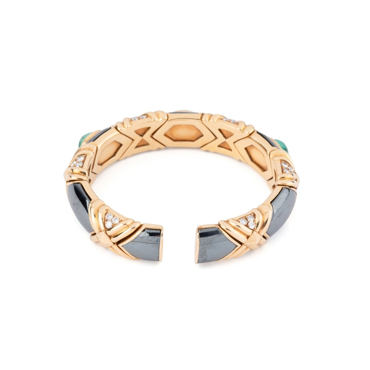 Bracelet Jonc BULGARI en or jaune, hématite, émeraudes et diamants - Castafiore