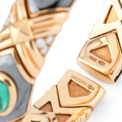 Bracelet Jonc BULGARI en or jaune, hématite, émeraudes et diamants - Castafiore