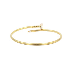 Bracelet CARTIER "Juste un Clou" wedding band in yellow gold and diamonds - Castafiore