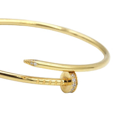 Bracelet CARTIER "Juste un Clou" wedding band in yellow gold and diamonds - Castafiore