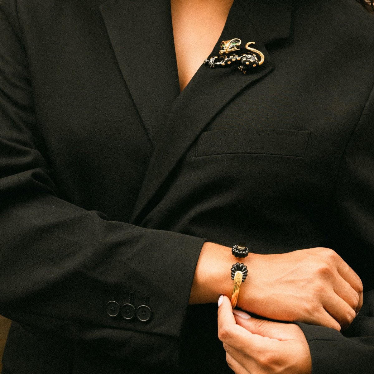 Bracelet Jonc CARTIER par ALDO CIPULLO en or jaune et onyx - Castafiore