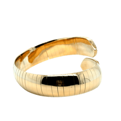 Bracelet Jonc CHAUMET "Plume" en or jaune et diamants - Castafiore