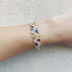 Bracelet Jonc CRISTILLI en or jaune, saphirs et diamants - Castafiore