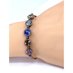 Bracelet jonc en or 18 carats, multipierres: saphir,topazes,citrine. Epoque Napoléon III - Castafiore