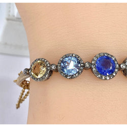 Bracelet jonc en or 18 carats, multipierres: saphir,topazes,citrine. Epoque Napoléon III - Castafiore