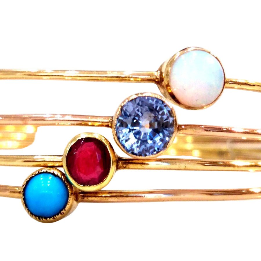 Bracelet Jonc en or jaune, opale, saphir, rubis et turquoise - Castafiore