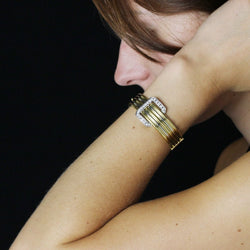 Bracelet Jonc en or jaune, or blanc et diamants - Castafiore