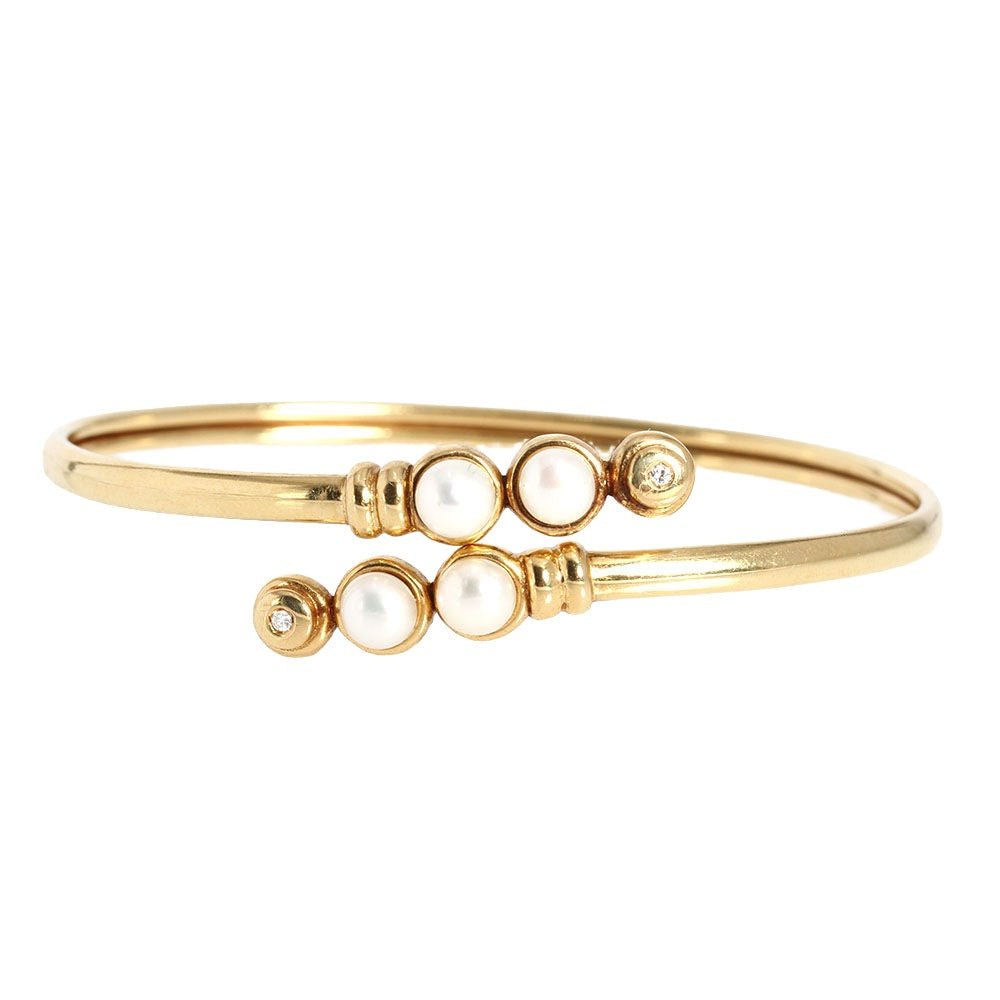 Bracelet jonc en or jaune, perles et diamants - Castafiore