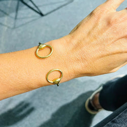 Bracelet Jonc HERMÈS "Nausicaa" en or jaune - Castafiore