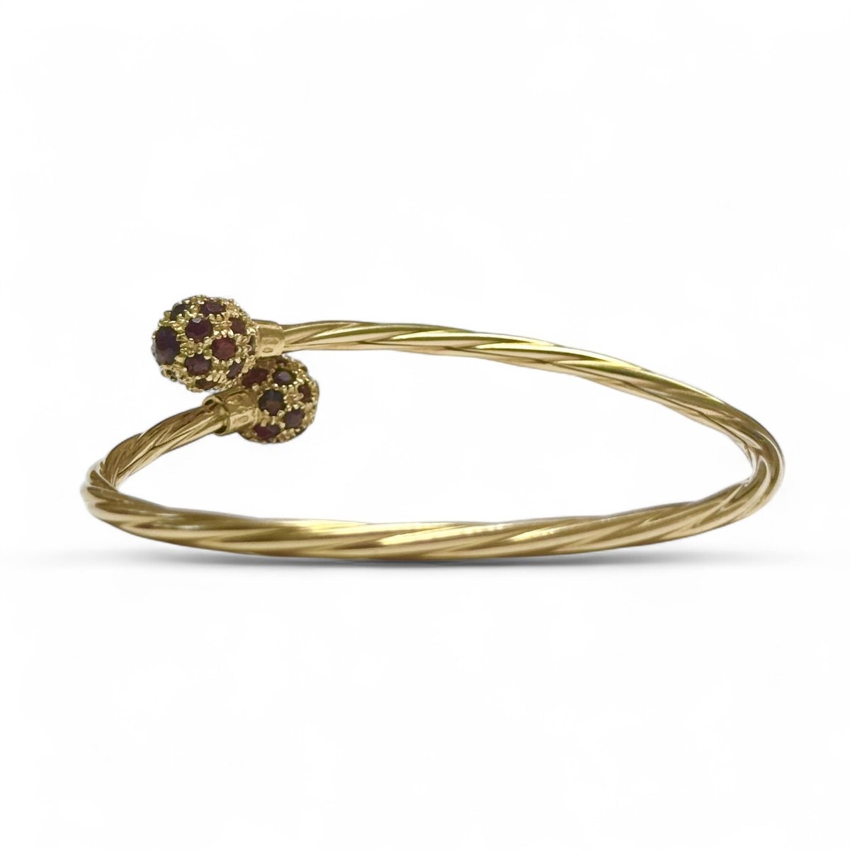 Bracelet jonc ouvert en or jaune et grenats - Castafiore