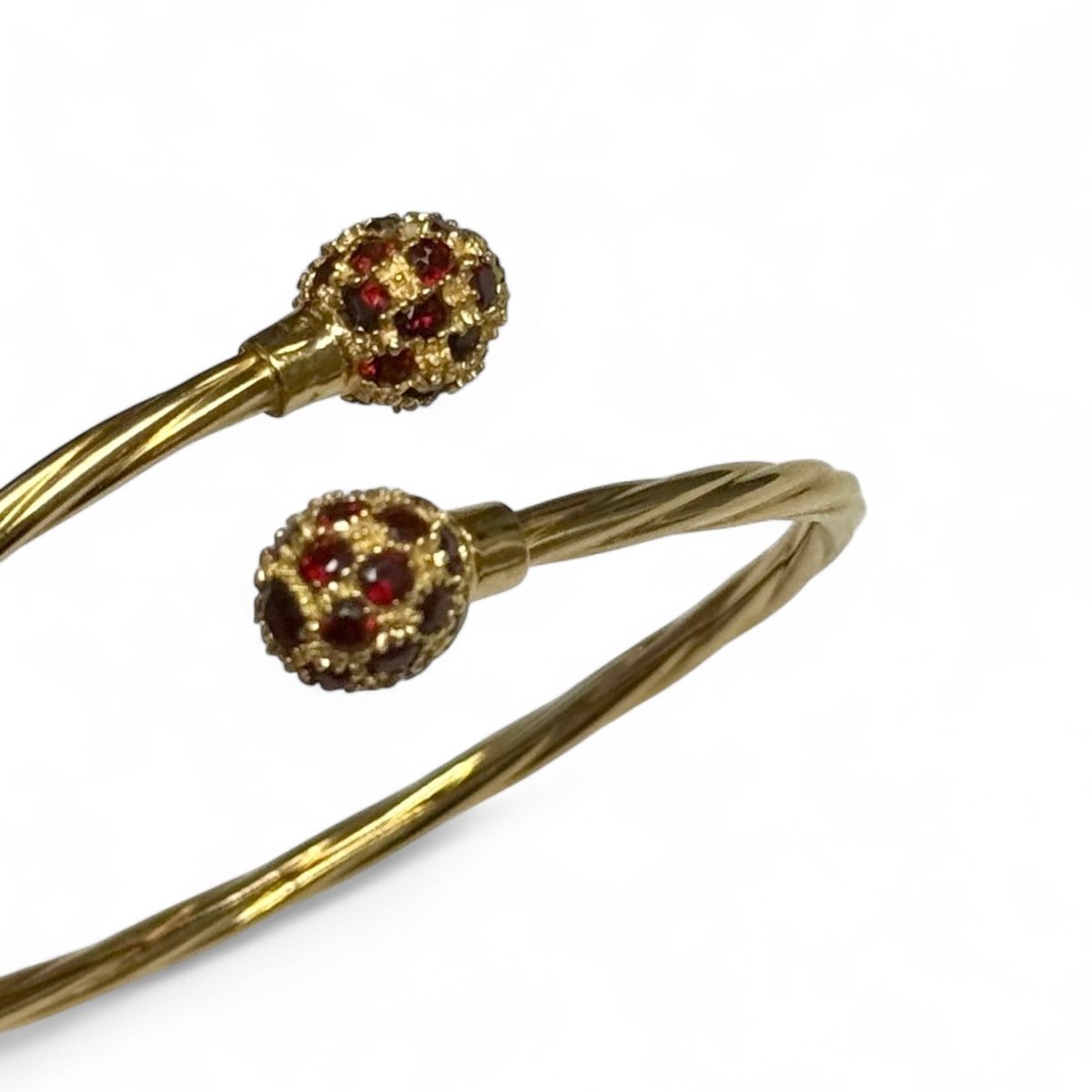 Bracelet jonc ouvert en or jaune et grenats - Castafiore