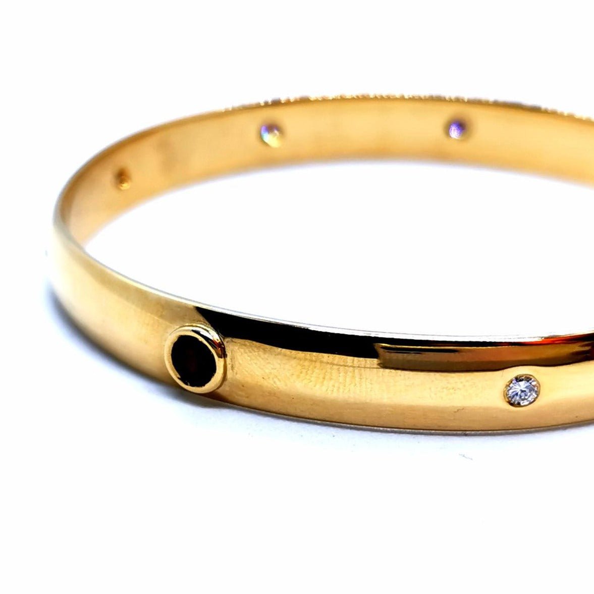 Bracelet Jonc rigide en or jaune et rubis - Castafiore