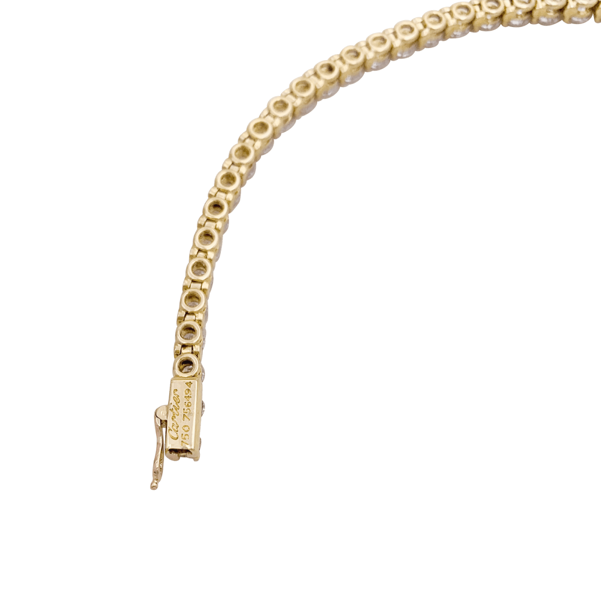 Bracelet Ligne CARTIER en or jaune et diamants. - Castafiore