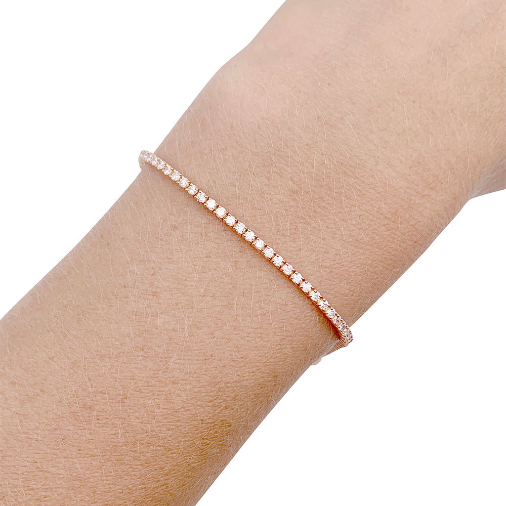 Bracelet ligne diamants en or rose. - Castafiore