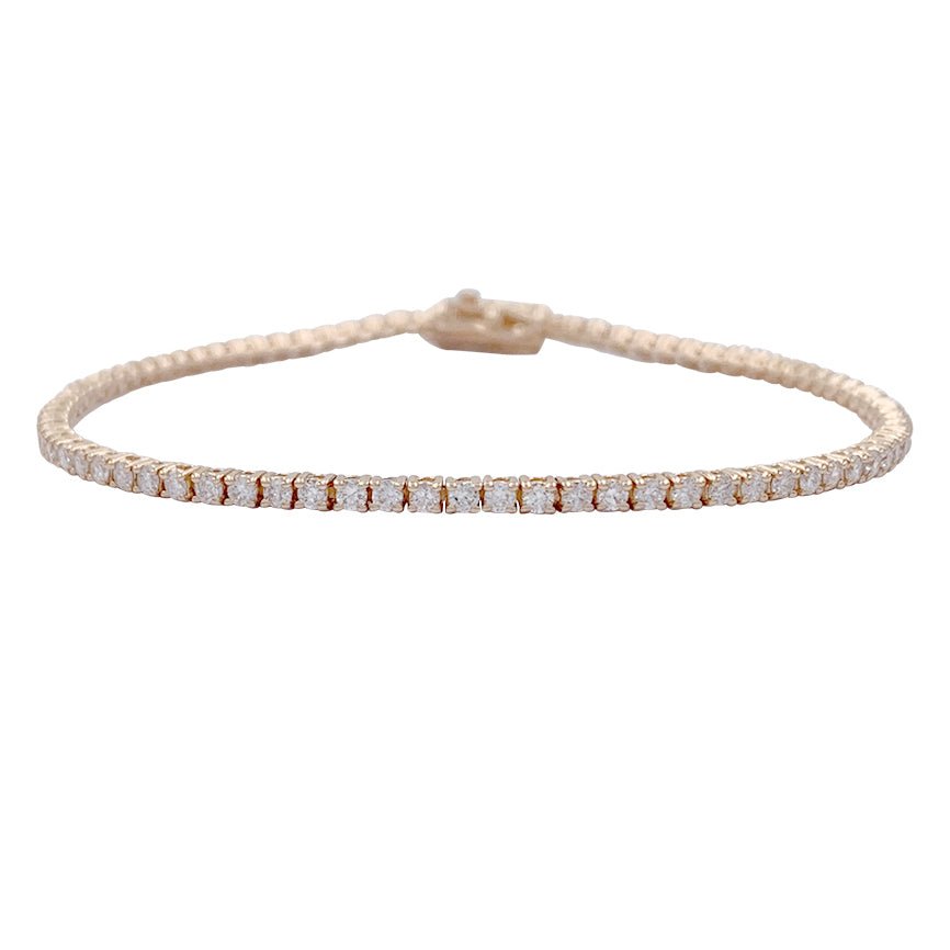 Bracelet ligne diamants en or rose. - Castafiore