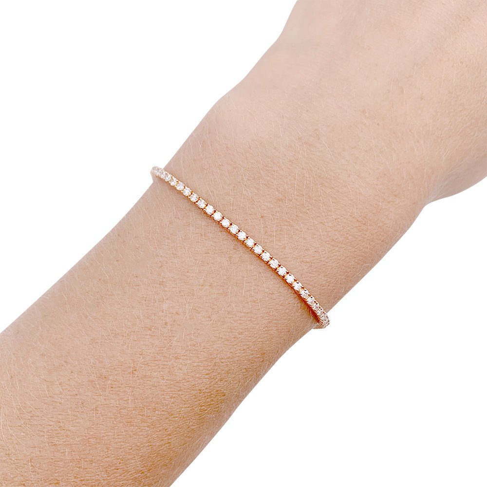 Bracelet ligne diamants en or rose. - Castafiore