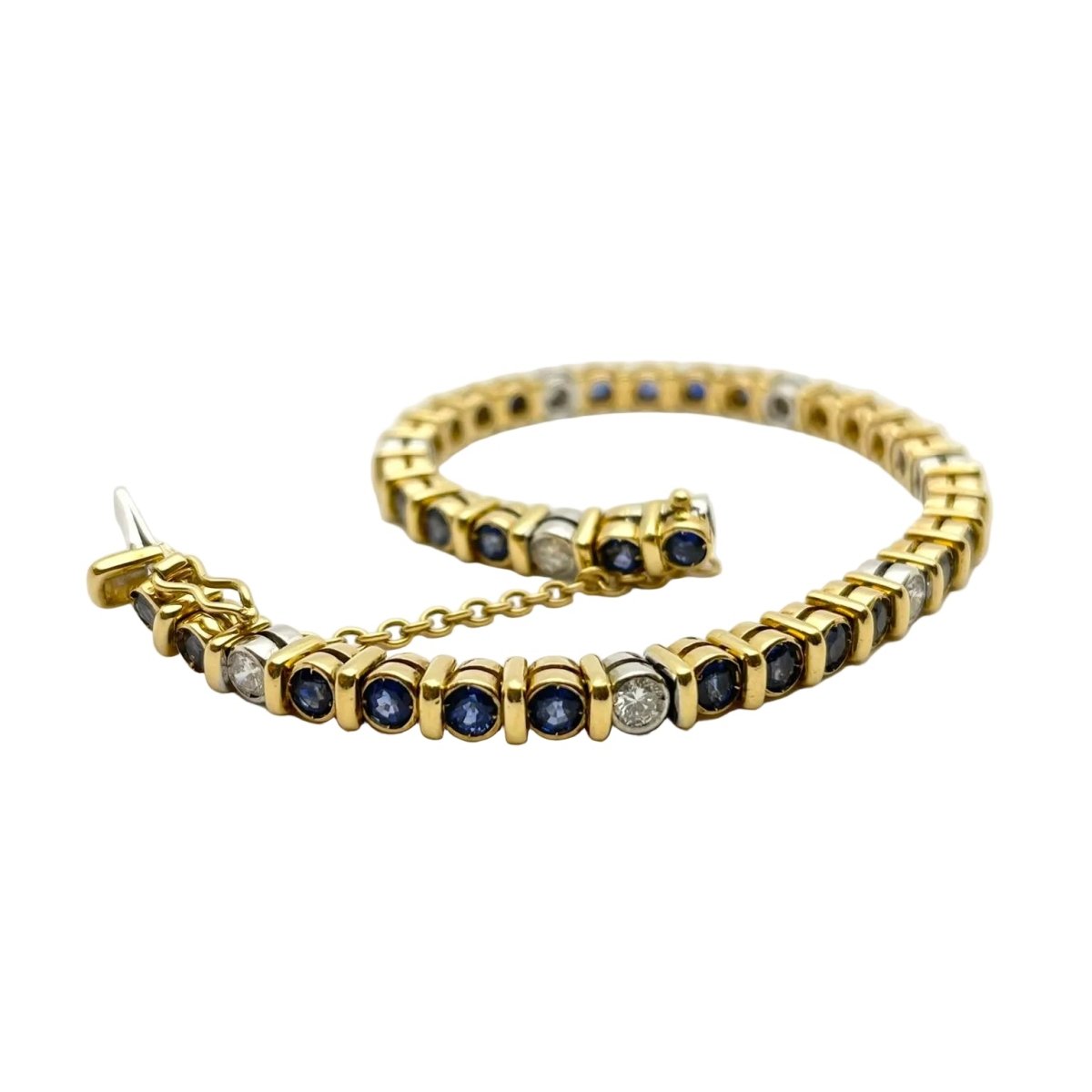 Bracelet Ligne en or blanc, or jaune, saphirs et diamants - Castafiore