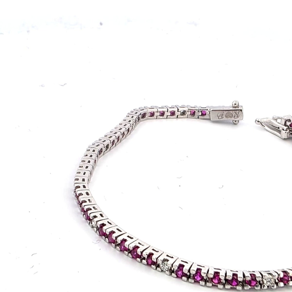 Bracelet Ligne en or blanc, rubis et diamants - Castafiore