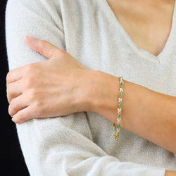 Bracelet Ligne en or jaune, émeraudes et diamants - Castafiore
